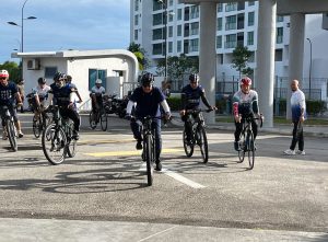 Yang di-Pertua Negeri Pulau Pinang Tun Dato’ Seri Utama Ahmad Fuzi Razak cycling into Utropolis Batu Kawan water station.