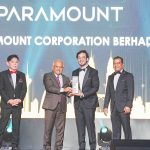 Benjamin Teo receiving award on stage