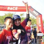 Family happy with the medal at Bukit Banyan Run