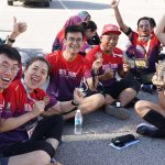 Finishers happy with their medal at Bukit Banyan Run