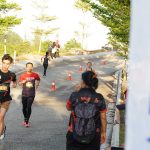 Runners racing to the finish line at Bukit Banyan Run