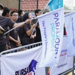 Cheerleaders cheering for Paramount team at Bursa Bull Charge 2023