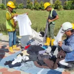 Workers given the first choice to pick out suitable donated clothing