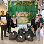 Paramount staff bringing donated clothes to the site